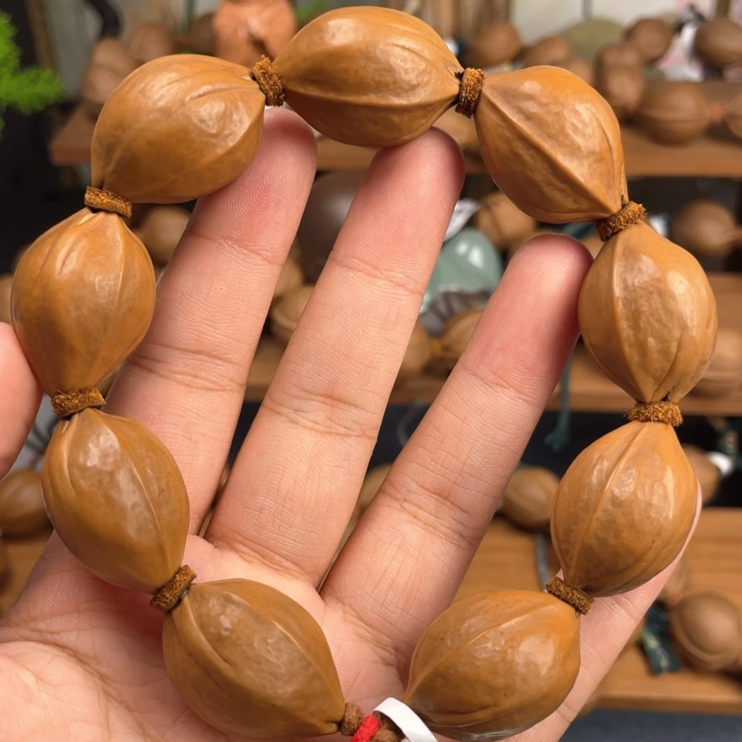 奔***牛橄榄核手串/手链20*25梅林铁核