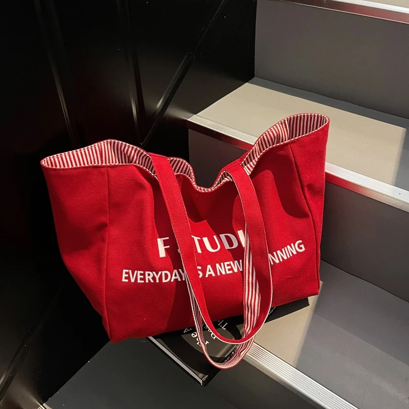 休闲大包包女2025款新品字母单肩包大容量托特包上课通勤斜跨包