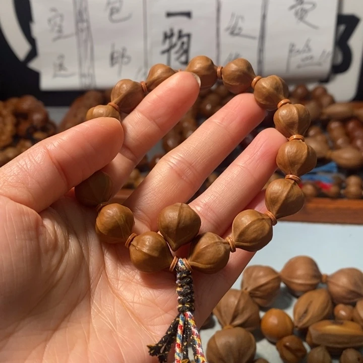 橄榄核手串4131精品蒜头铁核14+1颗+3通