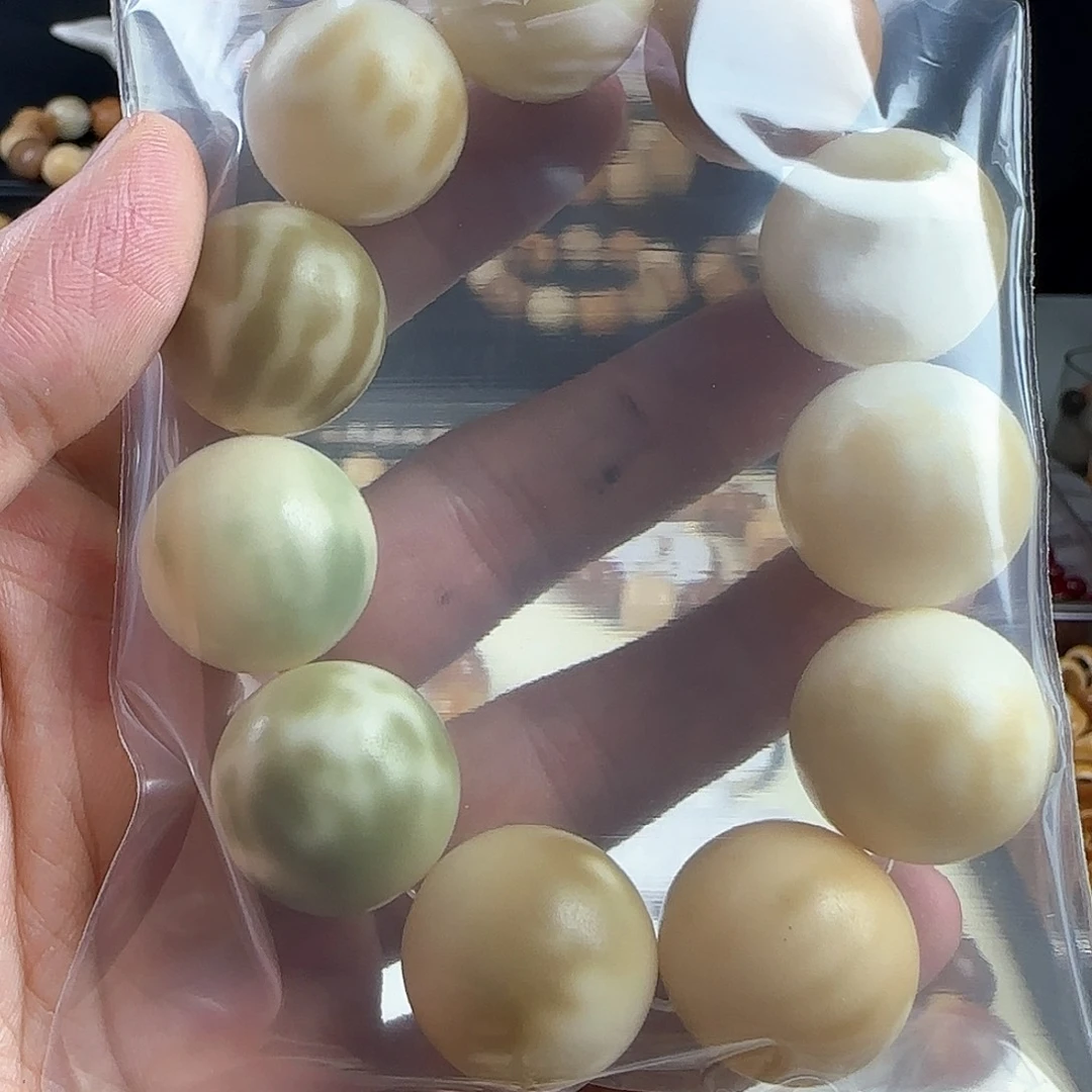 菩提根/象牙果手串龙*瑕疵卡23圆手串一条