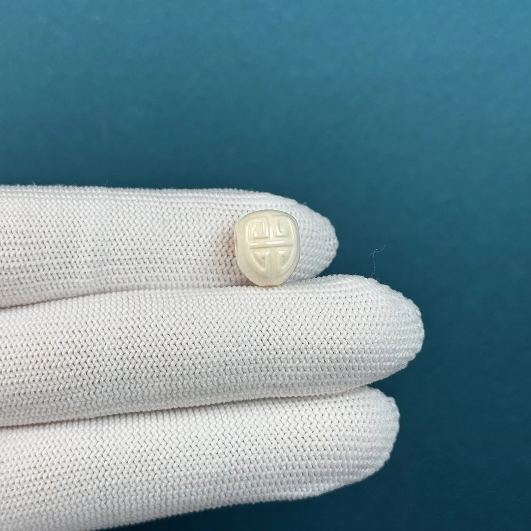 K74-18天然猛犸牙 古纹水滴三通9.7*12mm支持复检假一罚十