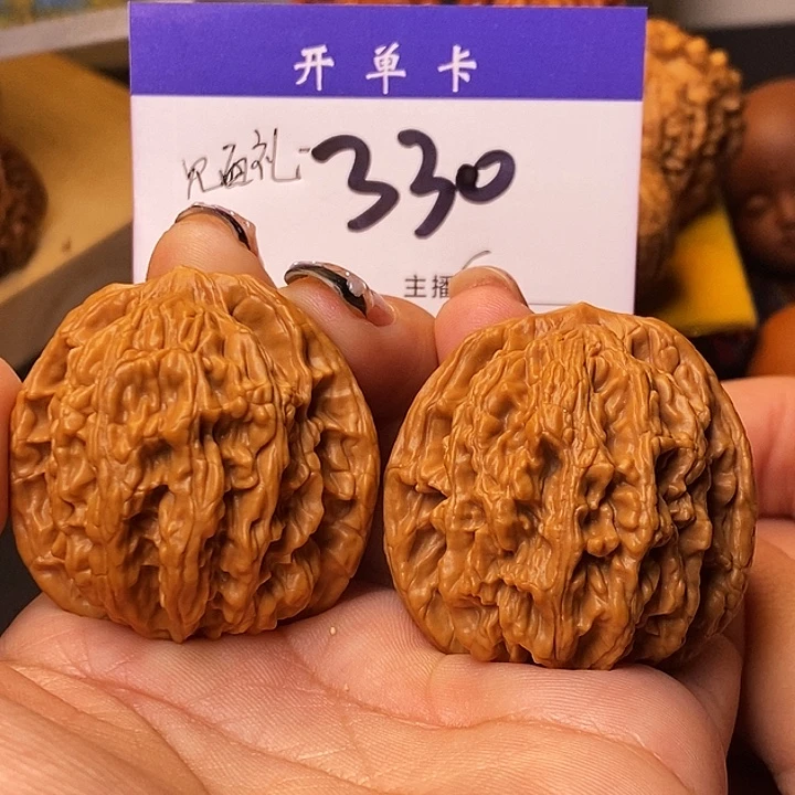 桃核吊坠虎头41有修s