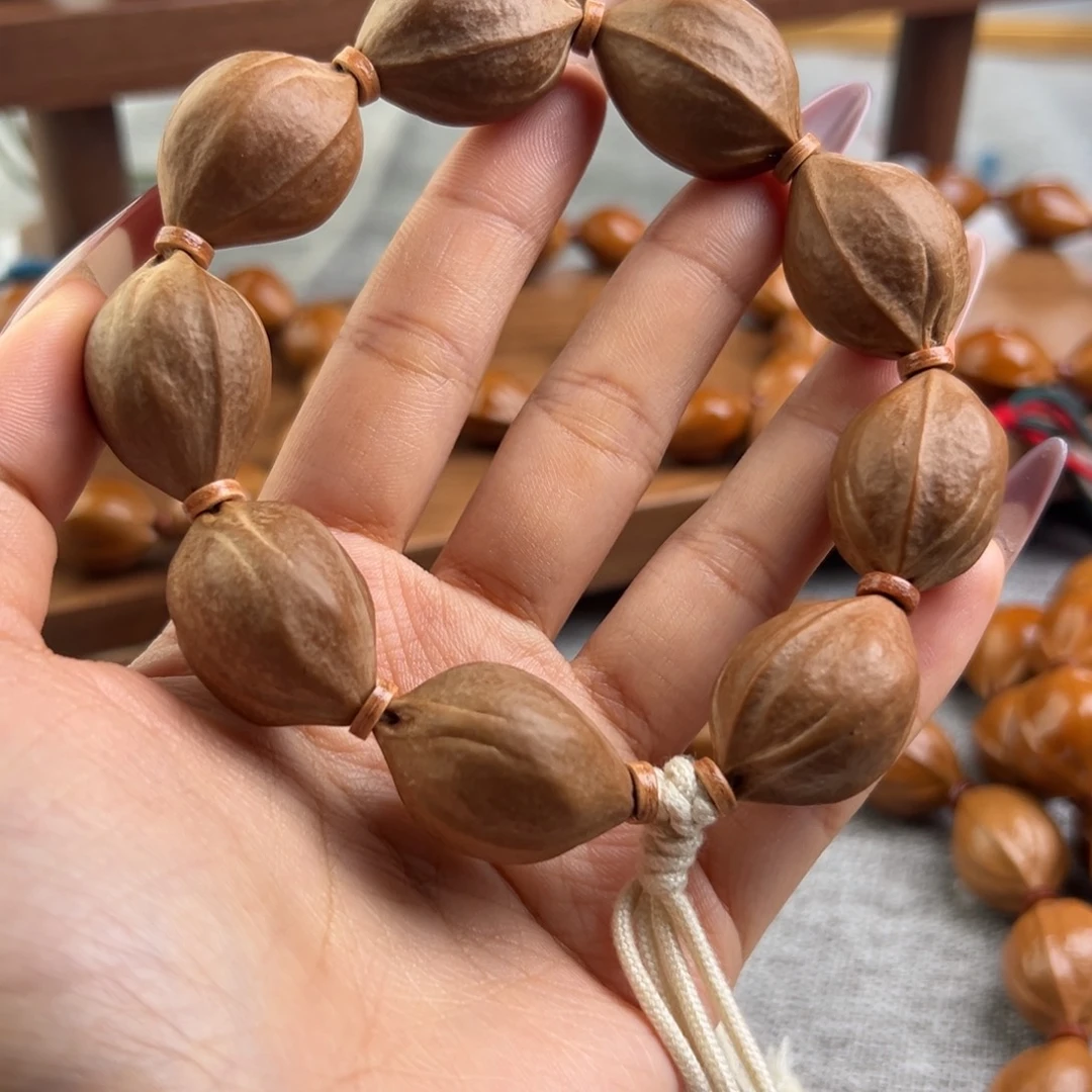 贩***怀橄榄核手串19/27三花梅林铁核