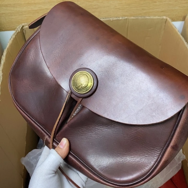 头层牛皮瑕疵单肩包