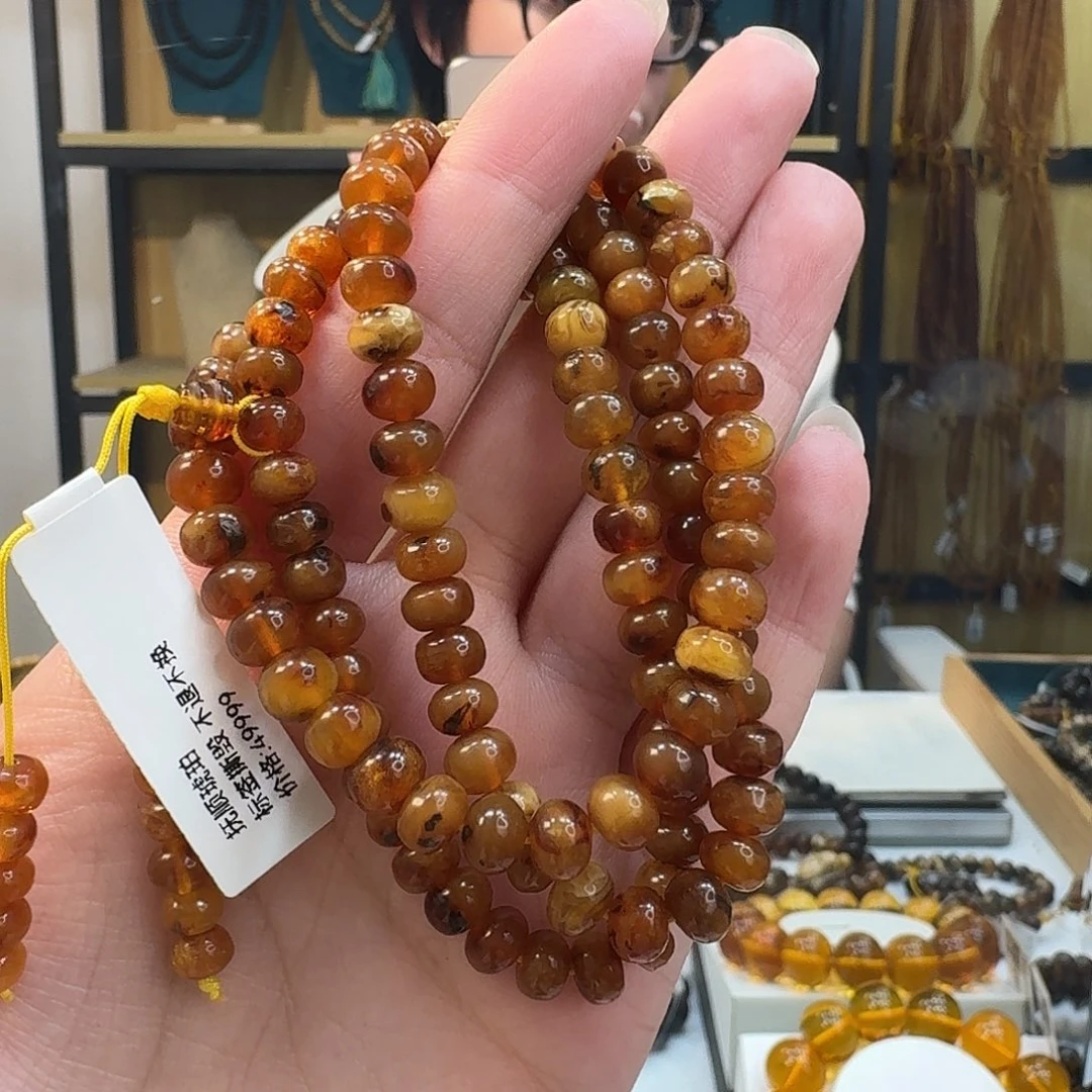 夕***阿琥珀未镶嵌裸石抚顺琥珀6mm蜡花