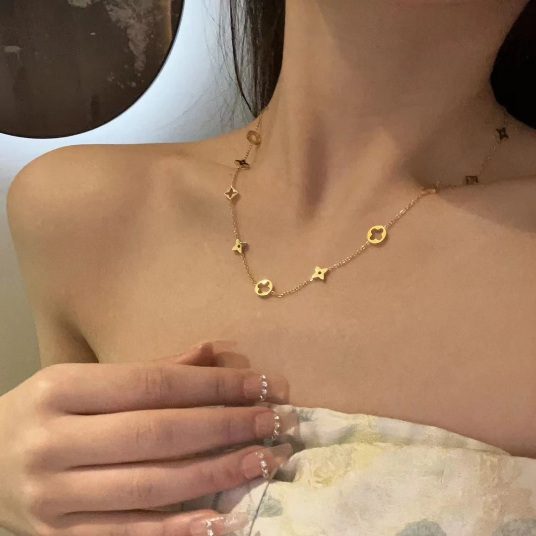钛钢亚克力项链时尚欧美轻奢风简约气质镂空四叶草花朵项链女钛钢