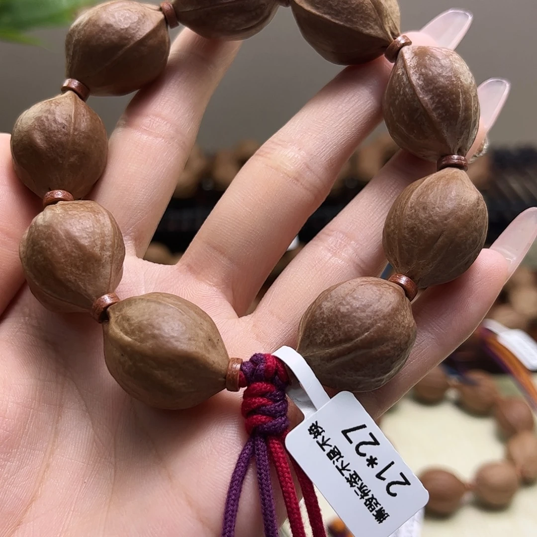 T***m吊坠橄榄核梅林铁核文玩手串