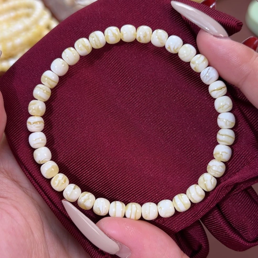 琥珀未镶嵌手串瓷漆白虎皮6.2m