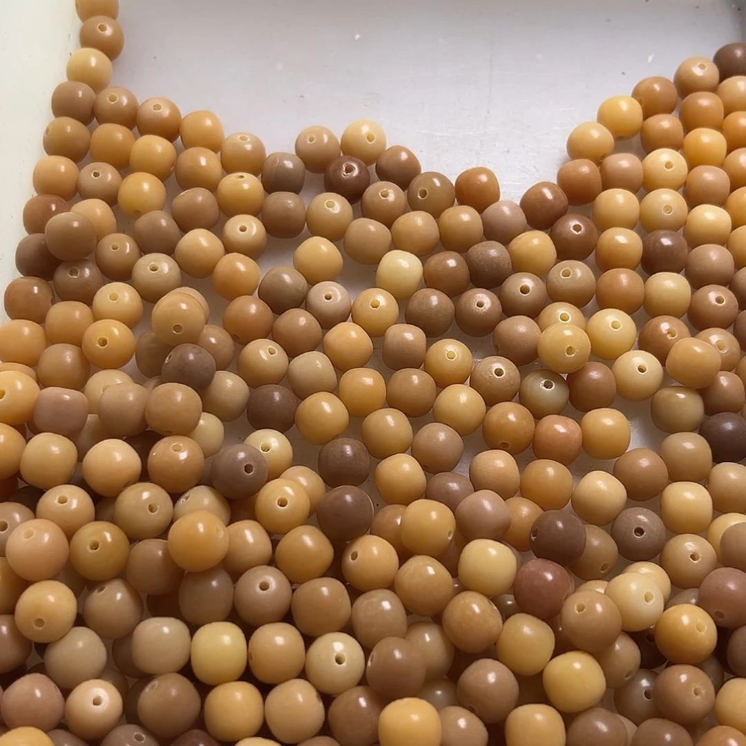 菩提根/象牙果吊坠ミ**丶微瑕11浅咖桶400颗