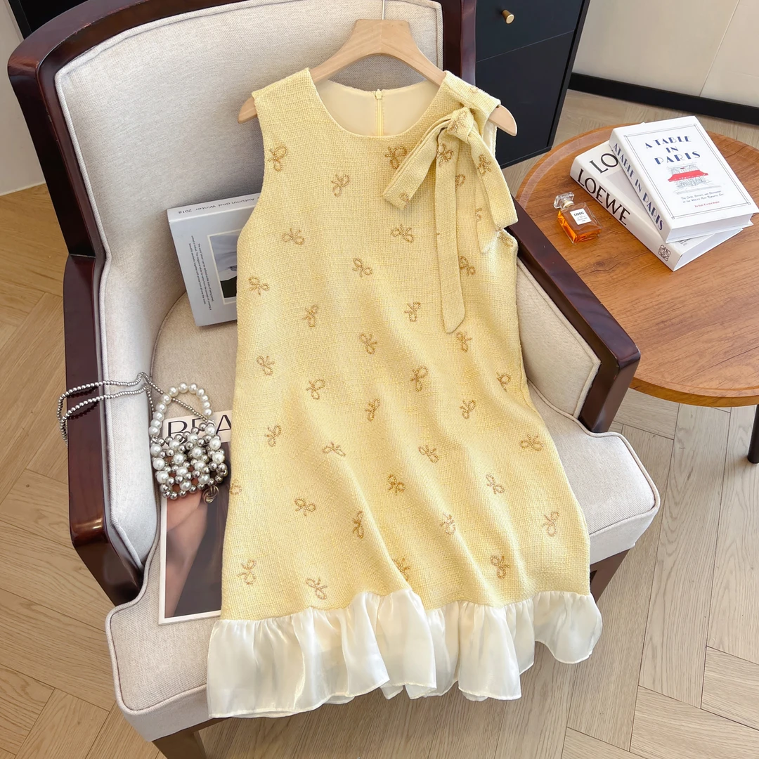 法式千金风黄色蝴蝶结飘带背心连衣裙女夏季设计感宽松无袖短裙子