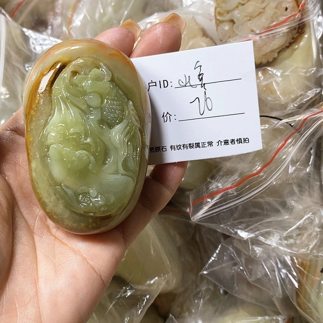 石材山**叔古青石手把件