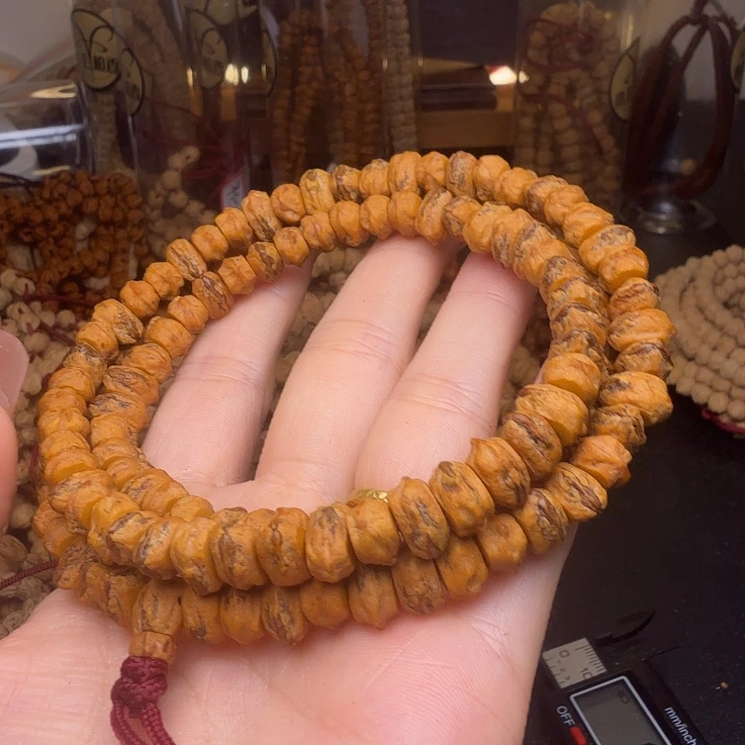 A***l柏香籽/百香籽吊坠藏直切红芽口横打