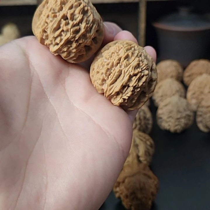 姜***片文玩核桃吊坠36球白