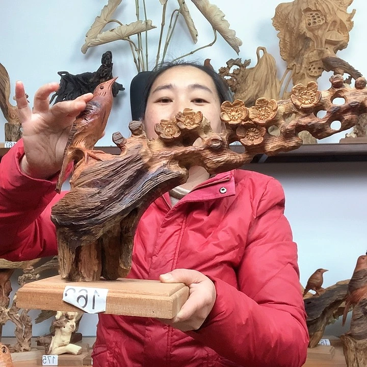 松木王****链琥珀木喜上眉梢摆件