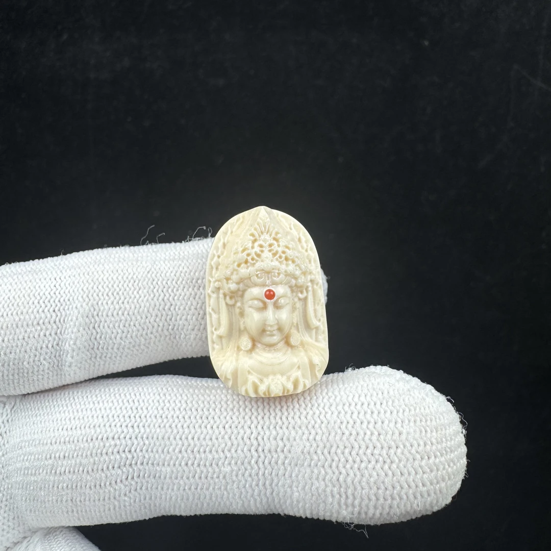 H86-02天然猛犸雕刻众宝观音 17*25*11,mm