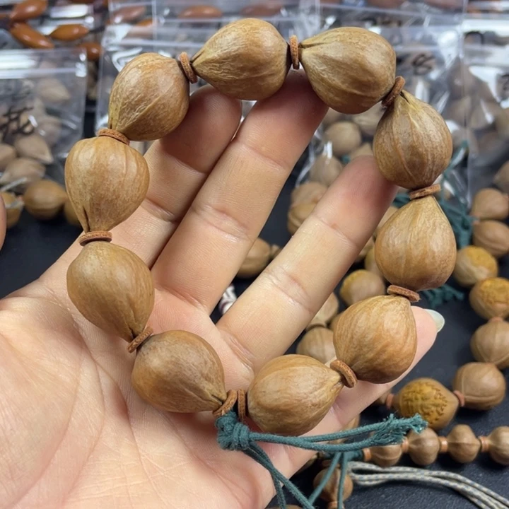 谁***酪橄榄核手串/手链橄榄核