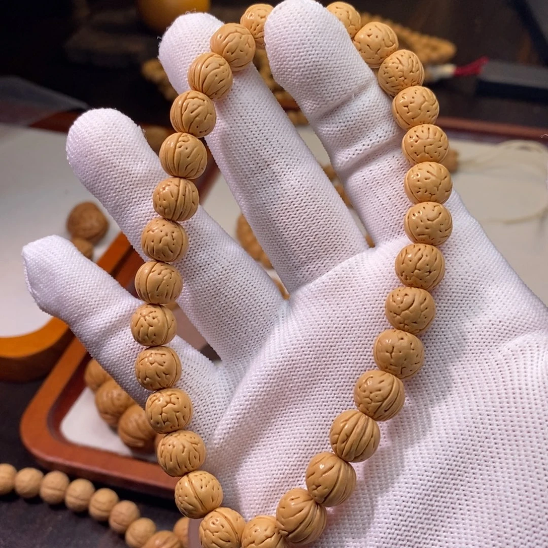 亿****吊坠桃核桃核手串宽脐黄桃