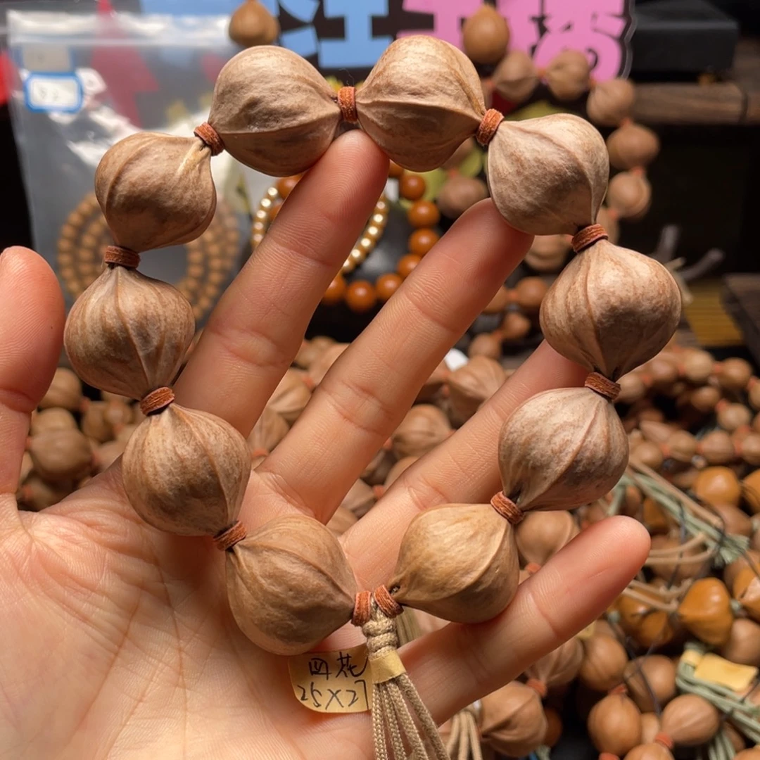 Y***P吊坠橄榄核2527四花铁核