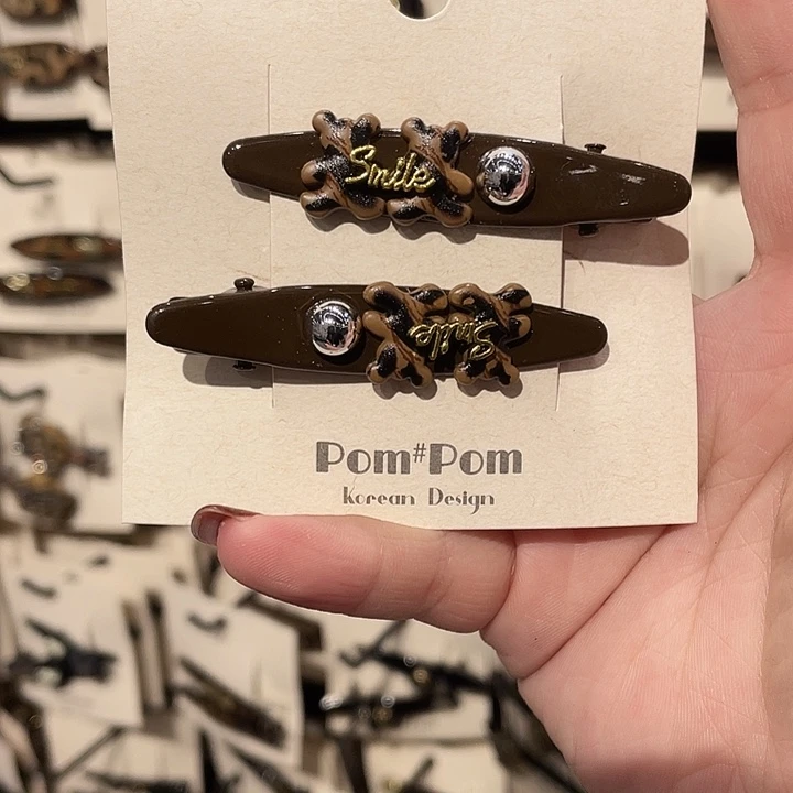 皮质非金属鸭嘴夹咖色