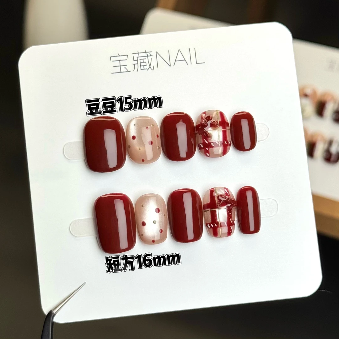 【新年礼物】纯手工穿戴甲10片 酒红彩绘蝴蝶结猫眼美甲