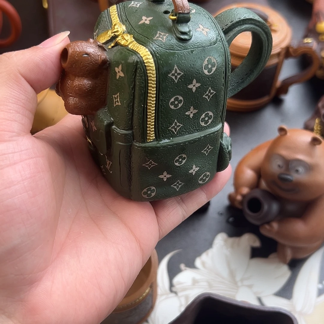 茶壶紫砂包包和帽子等着看