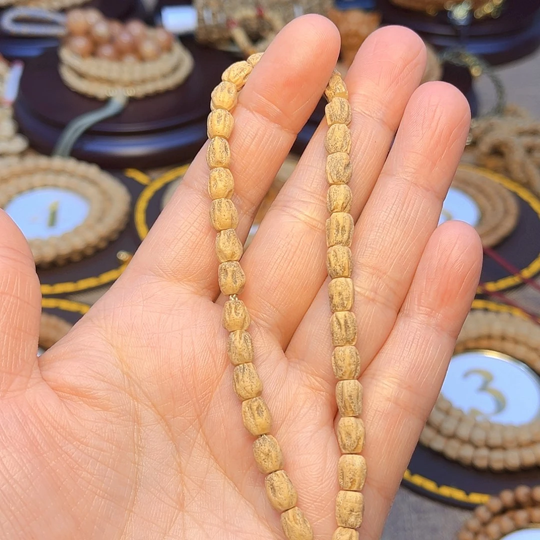 。***；手串柏香籽/百香籽