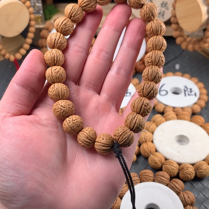 桃核手串宽脐金豆