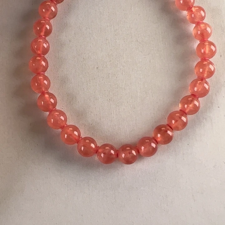 菱锰矿（红纹石）手串未镶嵌幽**霓