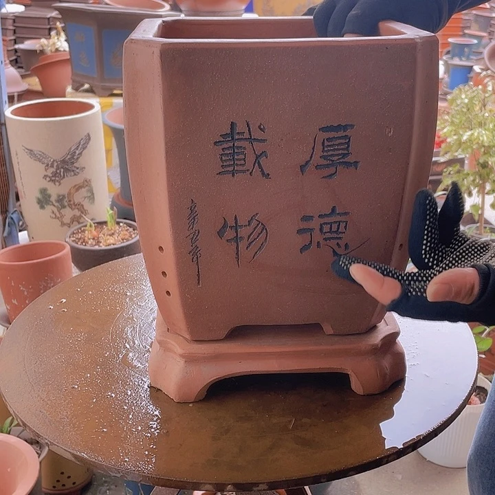 宜兴紫砂紫泥切角四方加拖