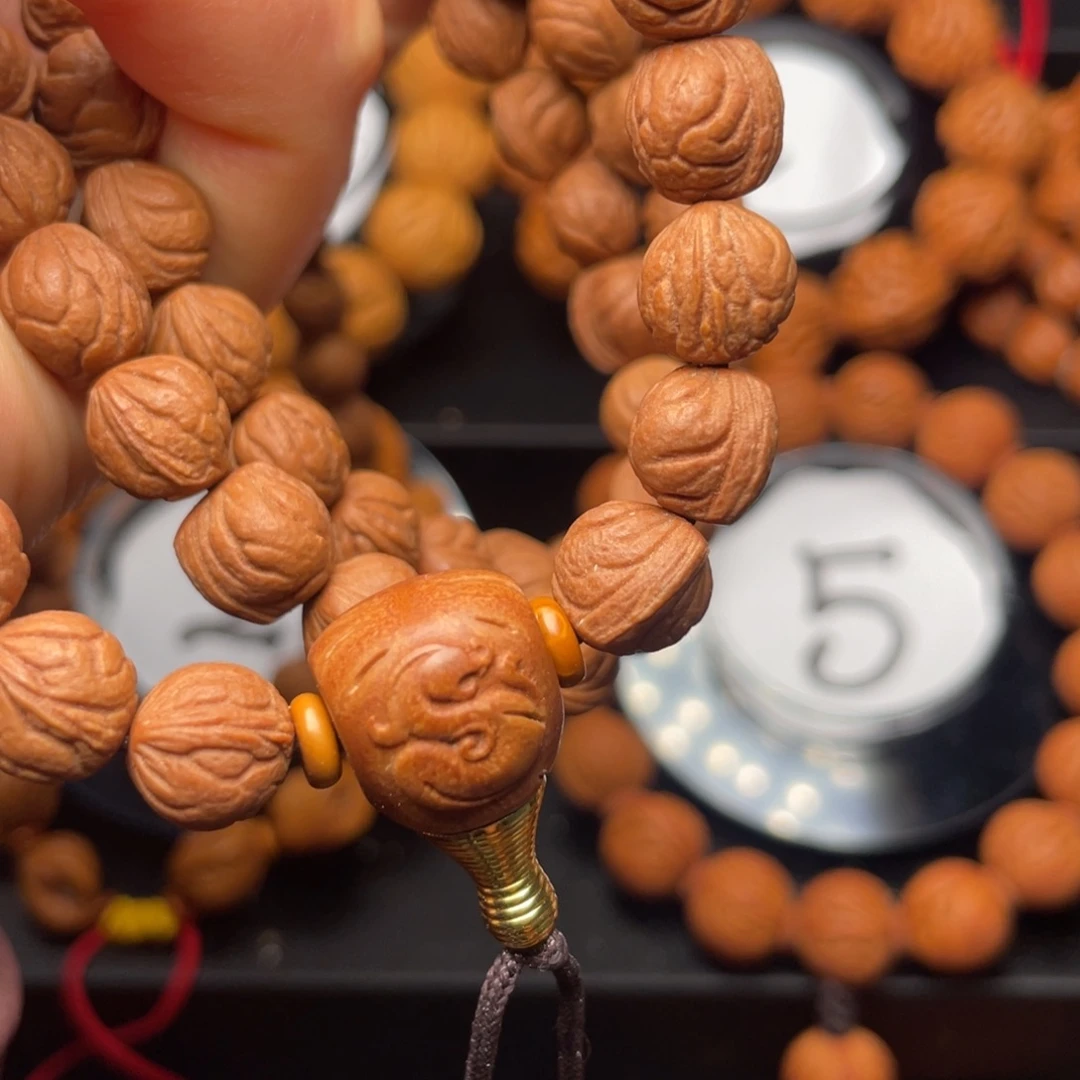 浮***华桃核吊坠红红火火