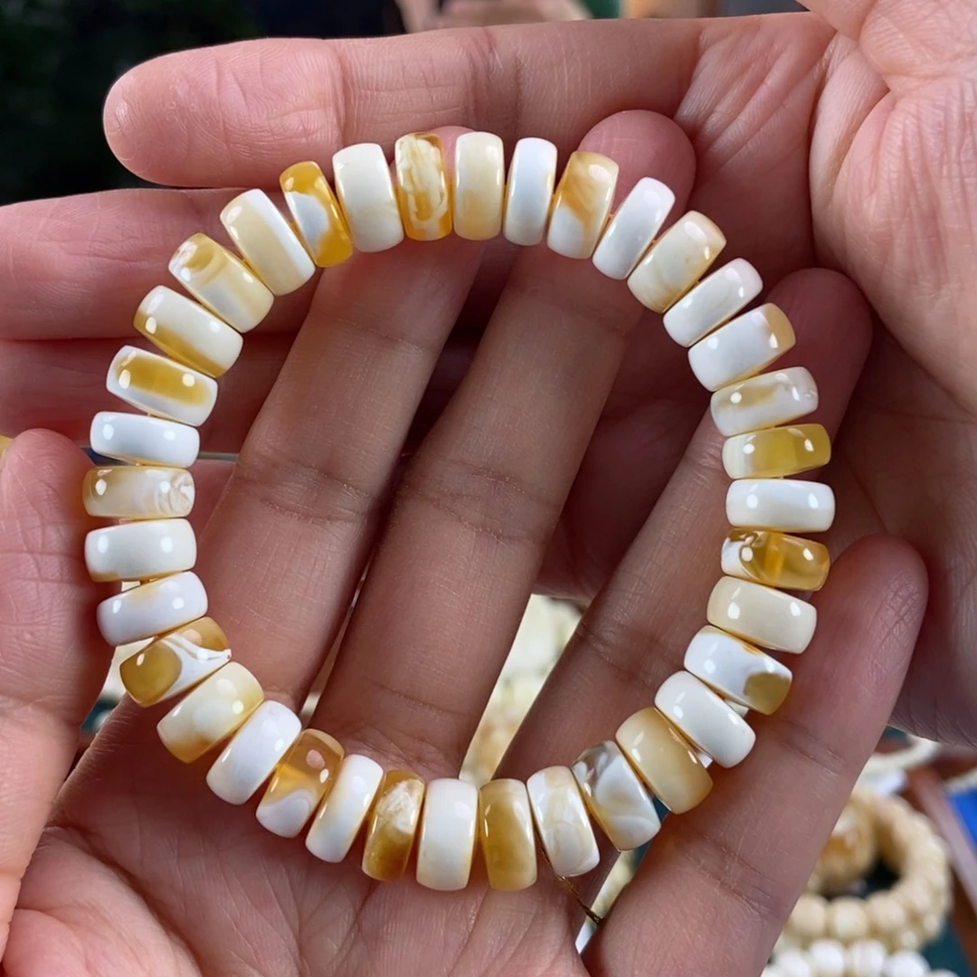 琥珀未镶嵌珠宝奇石11金瓷白溶洞妖隔片手串17.66