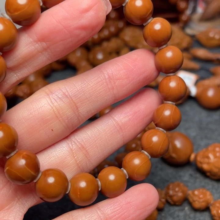 橄榄核吊坠邓***鱼橄榄核