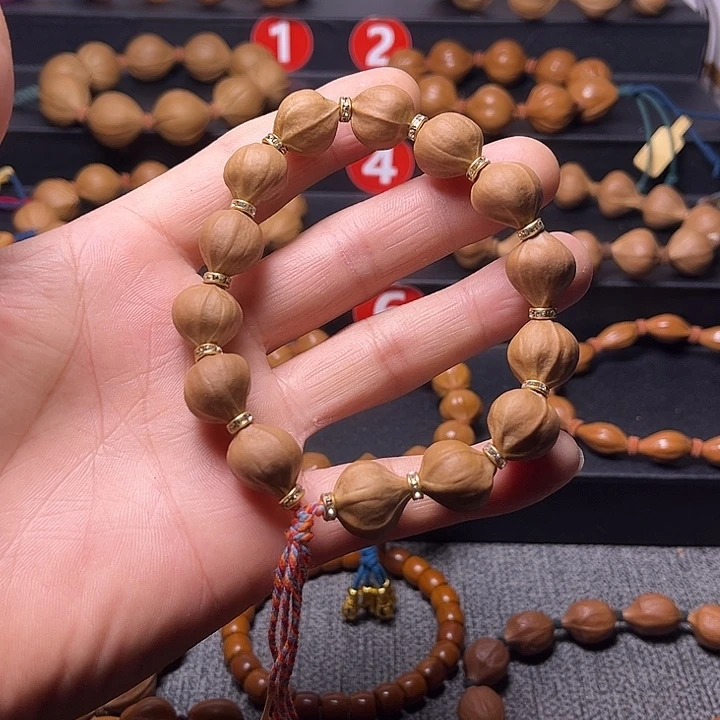 知***乐橄榄核吊坠橄榄核异形