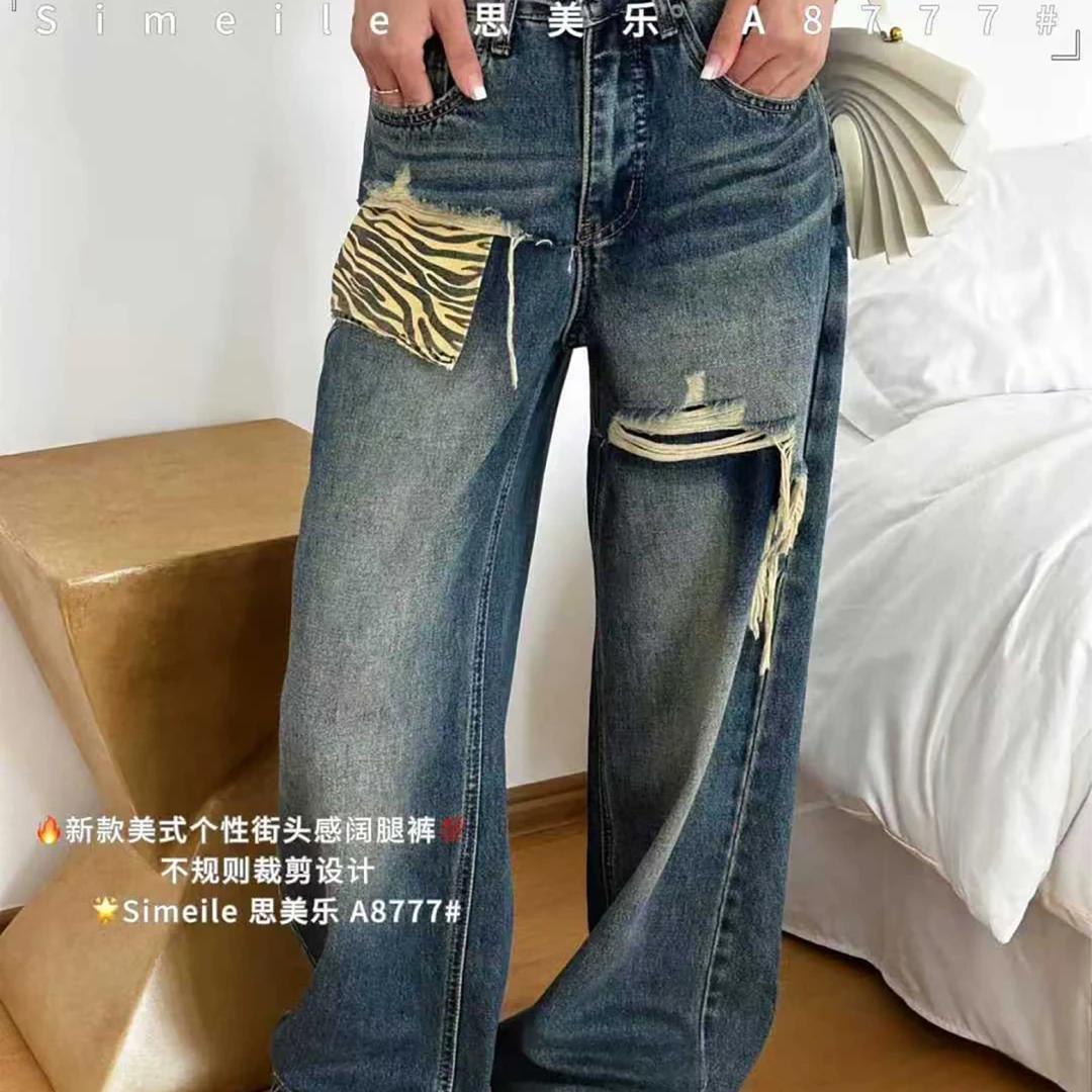 水洗蓝破洞拼接设计感女款牛仔裤2025年秋季新款高腰潮流百搭拖地