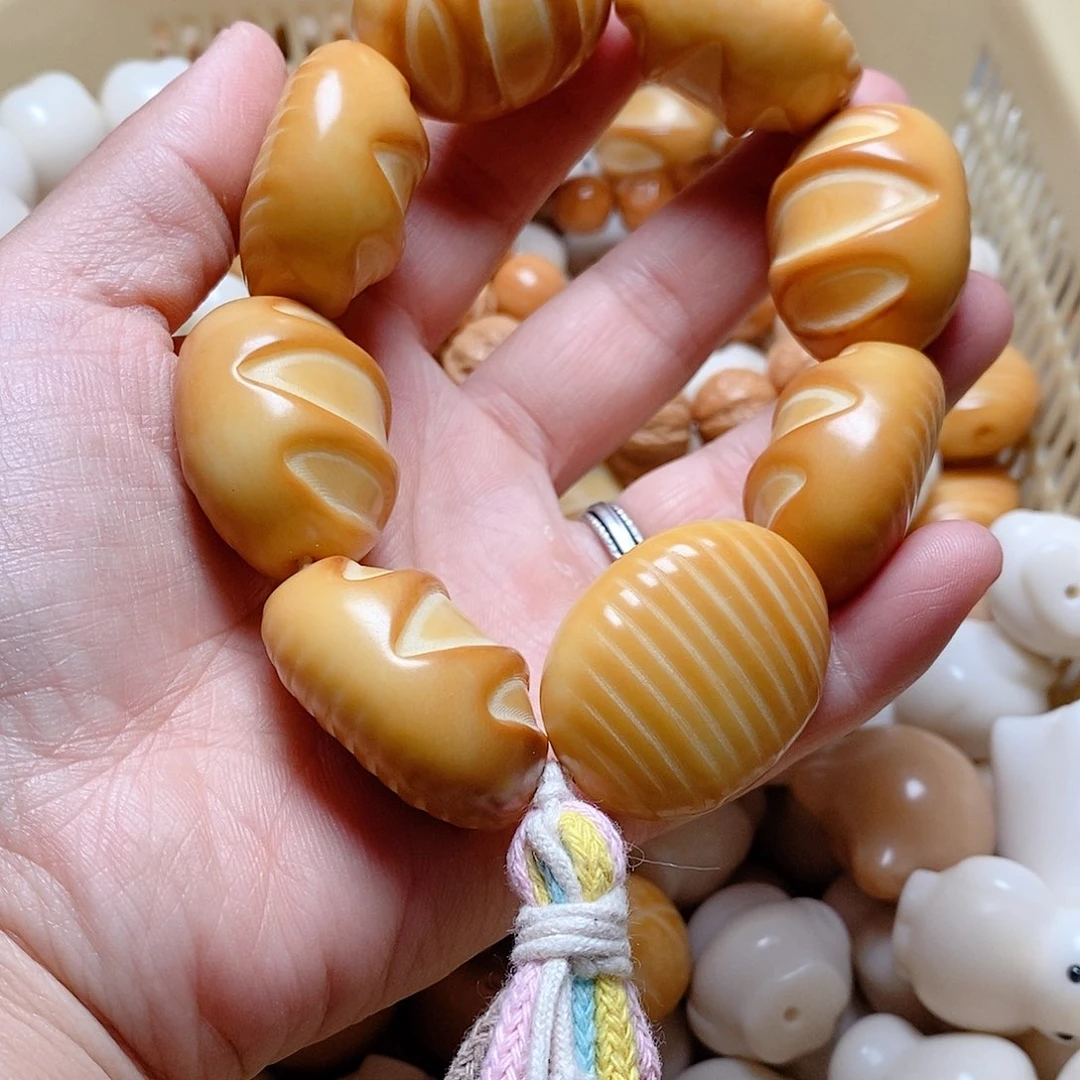 菩提根/象牙果吊坠微瑕疵大面包手持