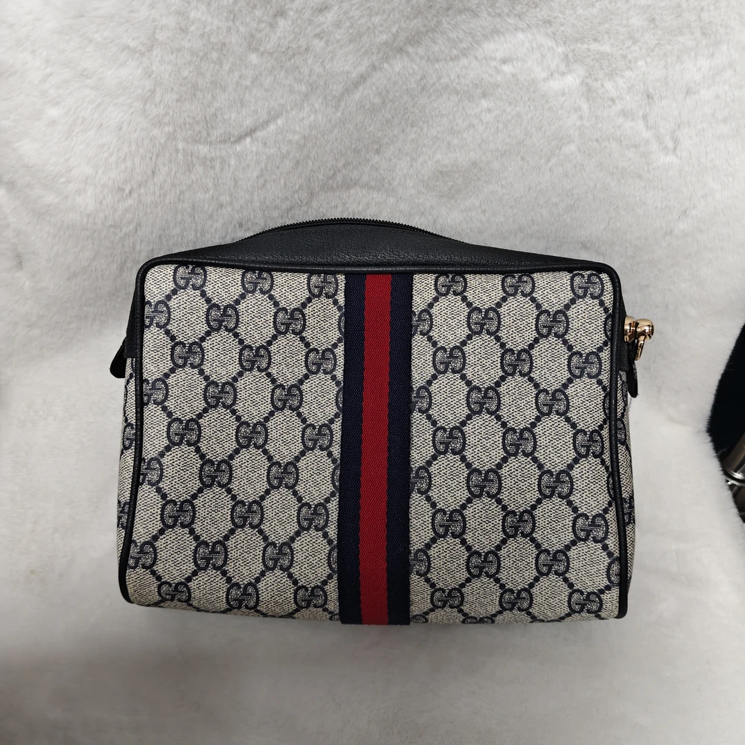 95新 GUCCI/古驰 M/古驰手拿包/09002