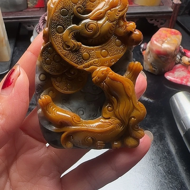 士***击昌化石昌化田黄手把件