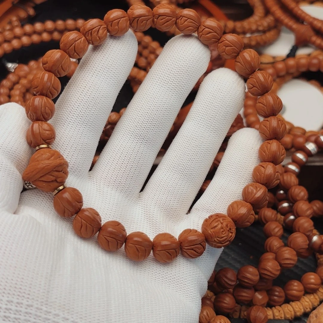 吊坠桃核玉龙脊手持