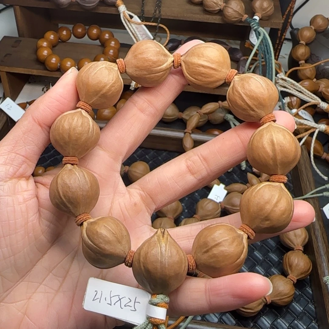 手串橄榄核19。2.15*2.5三花