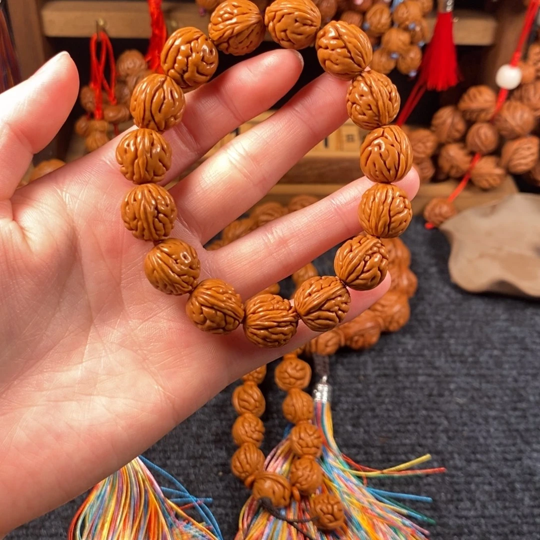吊坠桃核桃枭手串