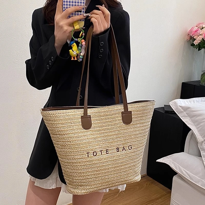 手提编织草编包女大容量2025新款夏季通勤托特包海边度假风沙滩包