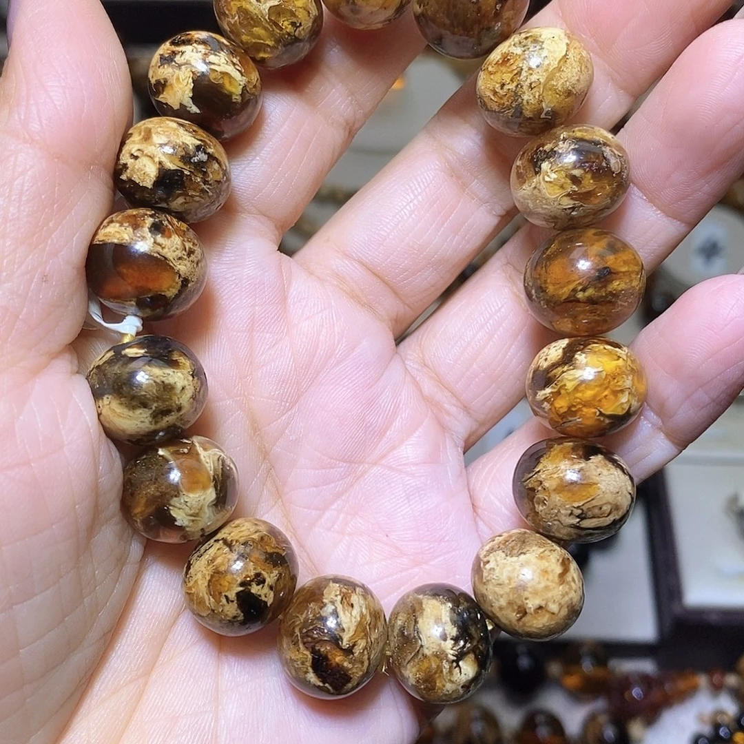 溜***熊裸石琥珀未镶嵌老黄花14m