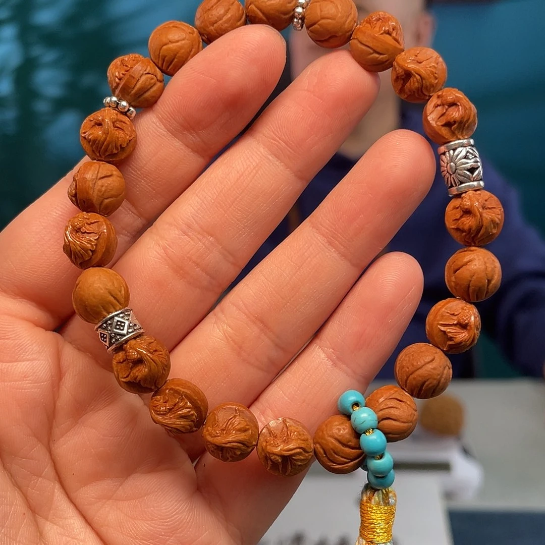 龙纹桃核金玉满堂核雕作品