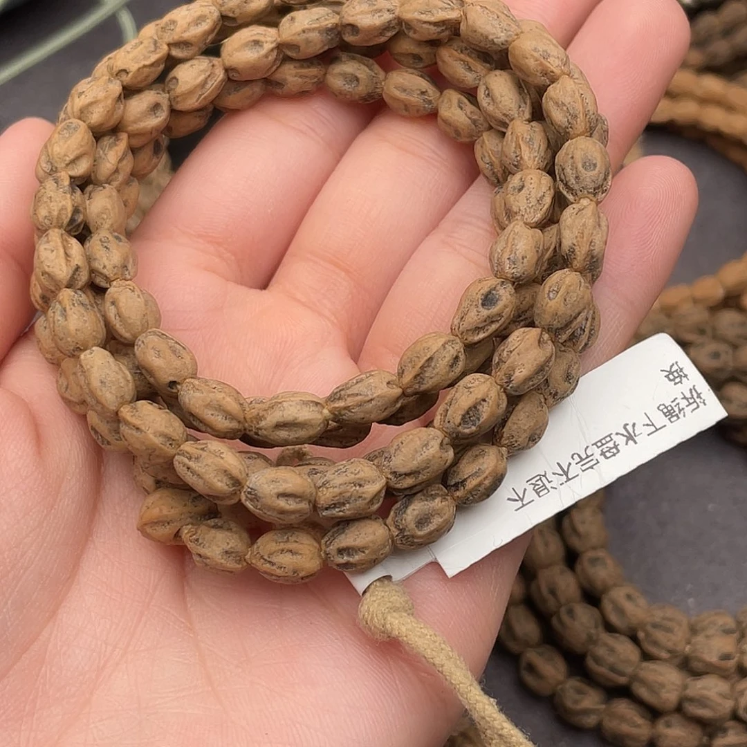 憧***来柏香籽/百香籽把件