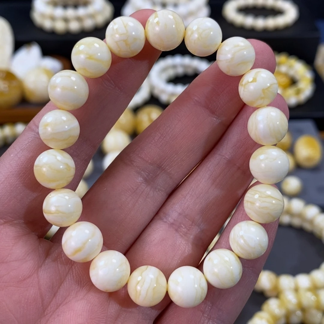 蜜蜡手串未镶嵌瓷白虎皮圆珠手串