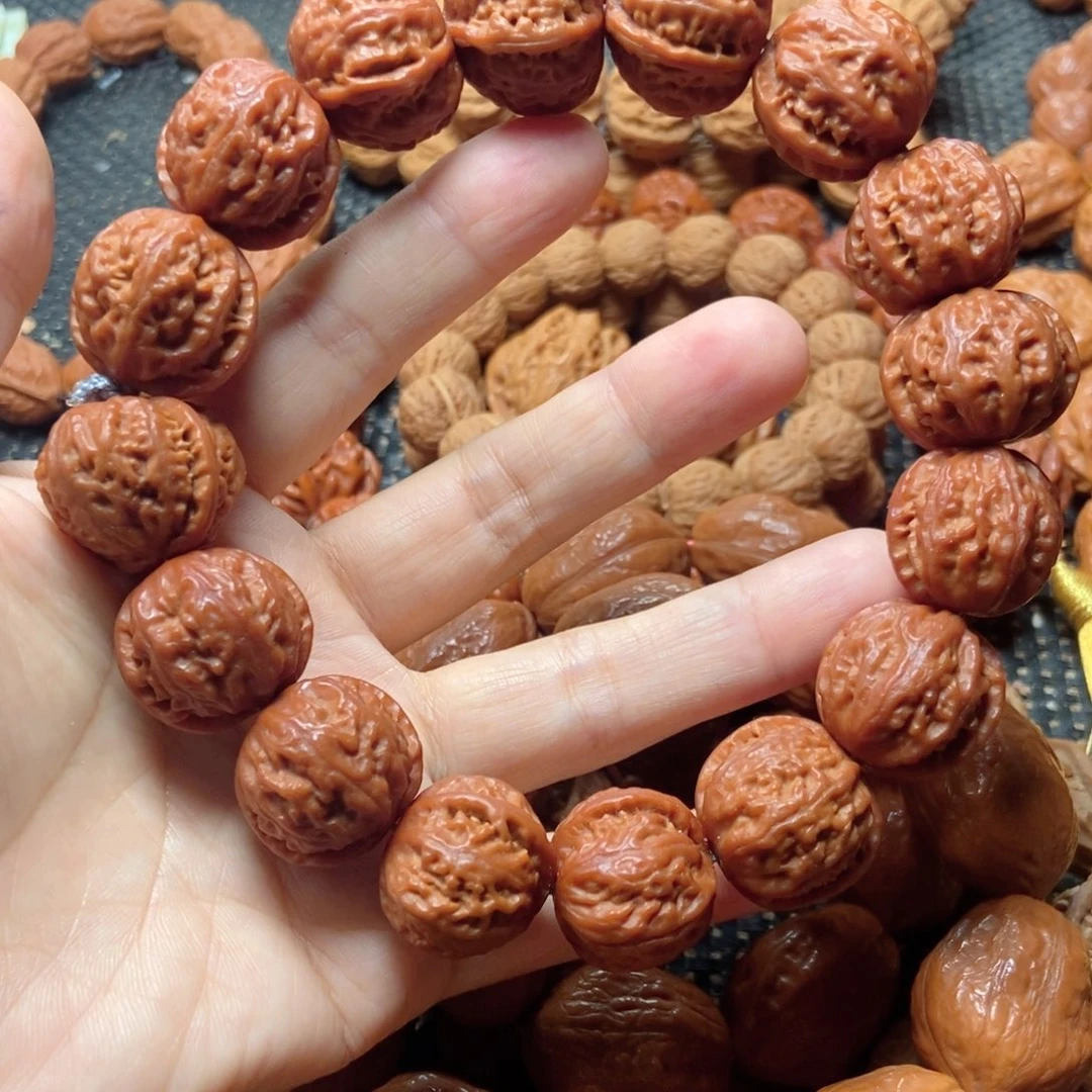 文玩核桃吊坠红皮粗筋手持