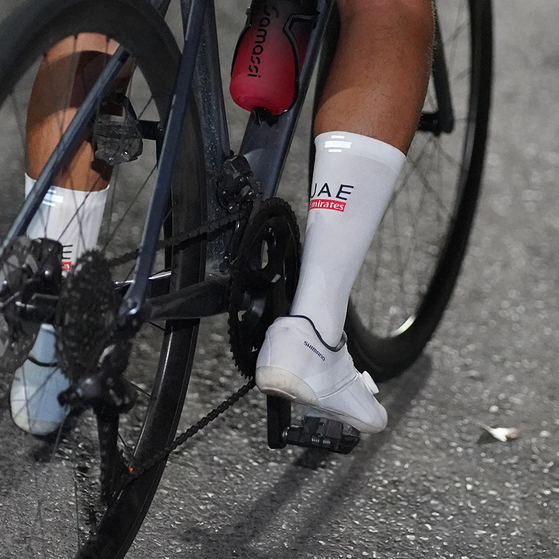 骑行袜子UCI推荐公路车专业新款夜骑车袜反光破风男款女除臭抗菌