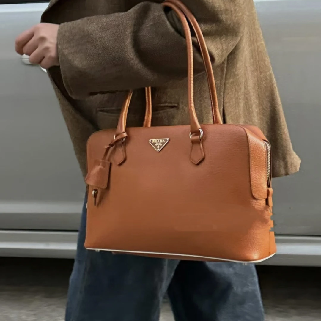 95新 Prada/普拉达 落日色plum手提单肩包橘色
