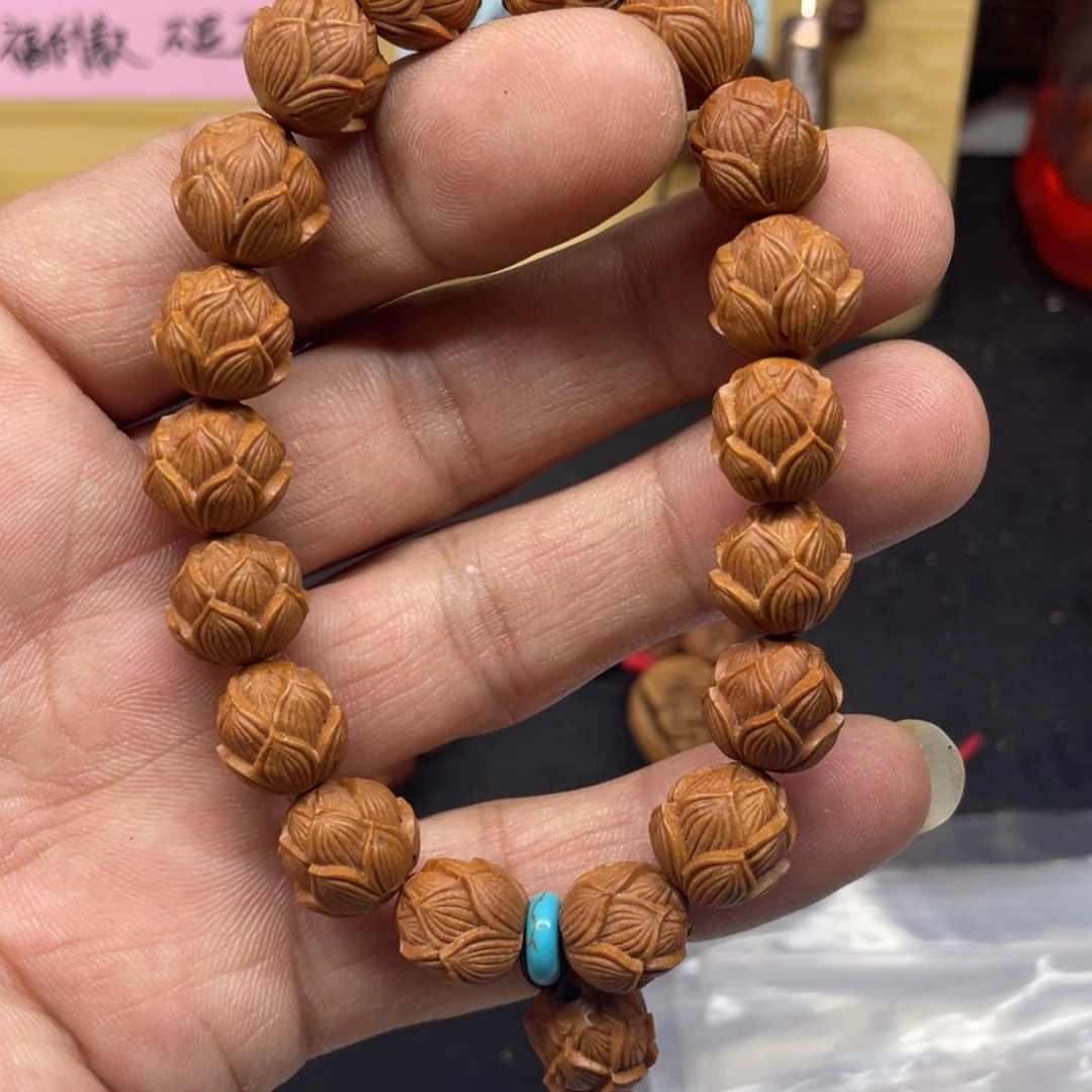龙纹桃核莲花手串