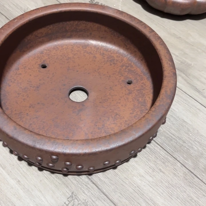 刮***骨紫砂花盆宜兴紫砂工艺厂。